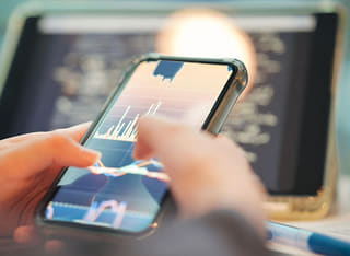 Person funding an account while reviewing a clear transfer and withdrawal procedure